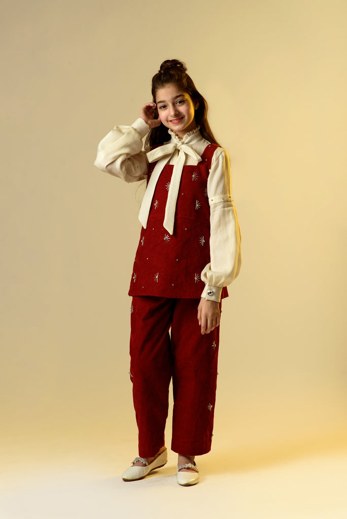 Isle of Dreams is a Carmine Red Organic Corduroy Coordinate Set With Off White Woollen Shirt For Girls.