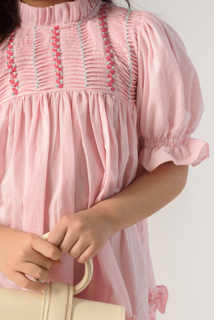 Valley of Flowers is a Thread Embroidered Organic Cotton Pink Dress For Girls.