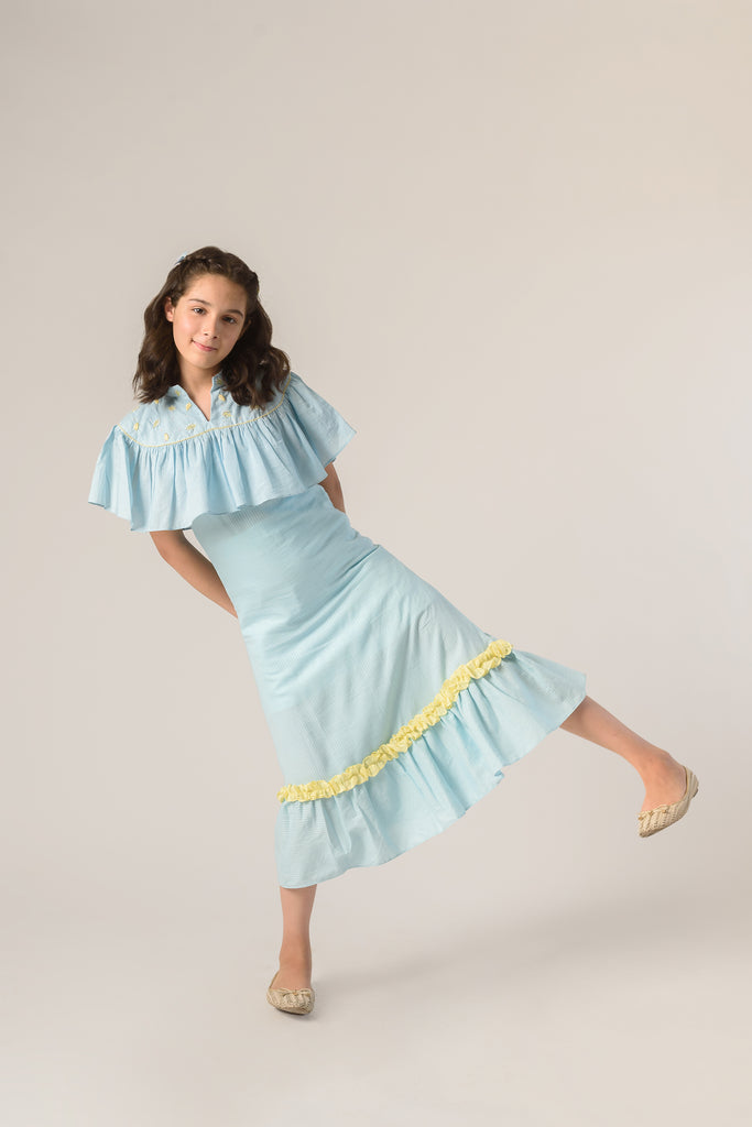 Days of tranquil is a Blue Color Organic Cotton Slip Dress With Embroidered Cape For Girls.