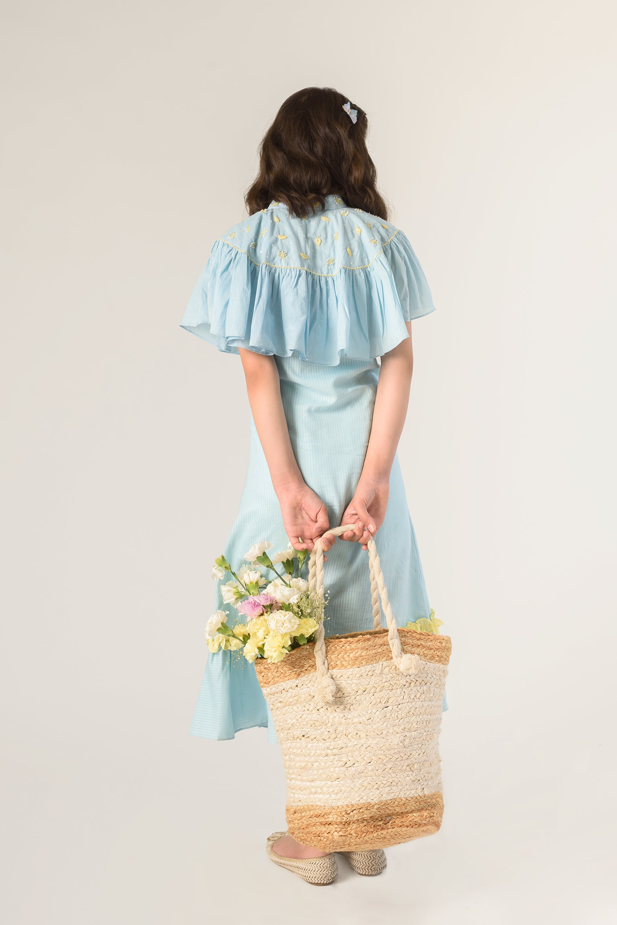 Days of tranquil is a Blue Color Organic Cotton Slip Dress With Embroidered Cape For Girls.