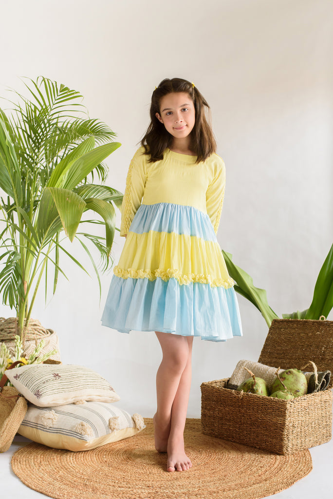 Sunset at Alleppey is a Blue & Yellow Organic-Cotton Tiered Dress For Girls.