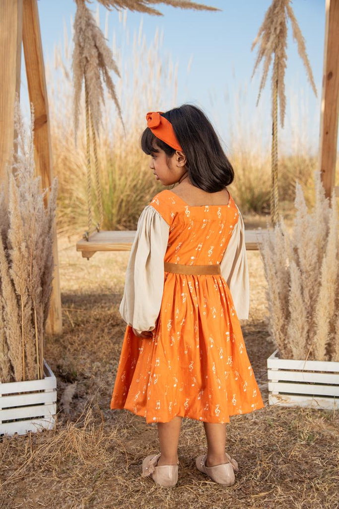 Tangy Tale is an Eri Silk Dress with Banana Fabric Sleeves For Girls.