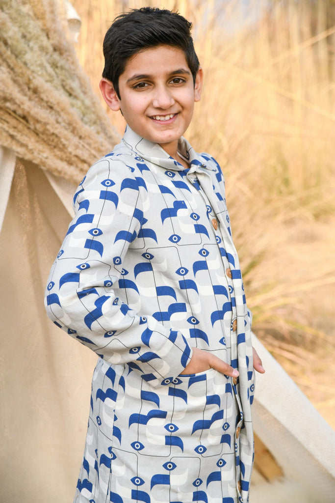 Tesselated Chink is an Organic Cotton Canvas Trench Coat For Boys.