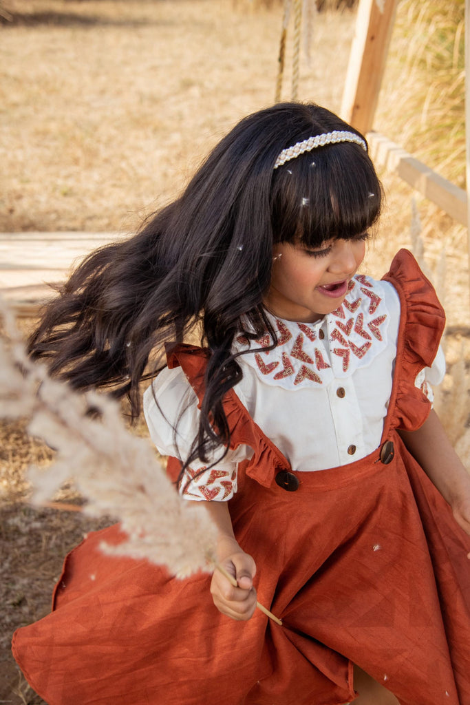 Little Preppy is an Aloe Vera Fabric and Exclusive Recycled Suede Leather Made Pinafore Dress For Girls.