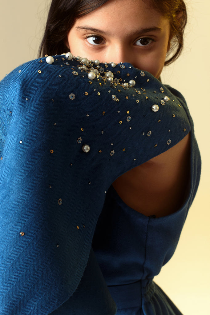 Sparking Flutter is a Sapphire Blue Organic Wool Herringbone Jumpsuit For Girls.