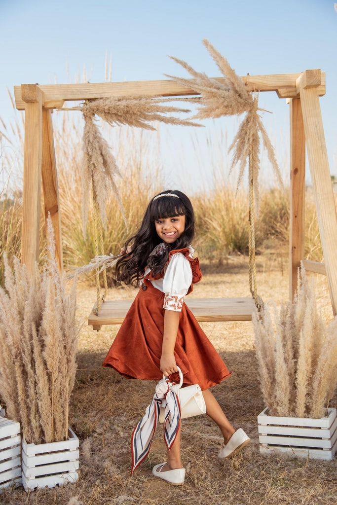 Little Preppy is an Aloe Vera Fabric and Exclusive Recycled Suede Leather Made Pinafore Dress For Girls.