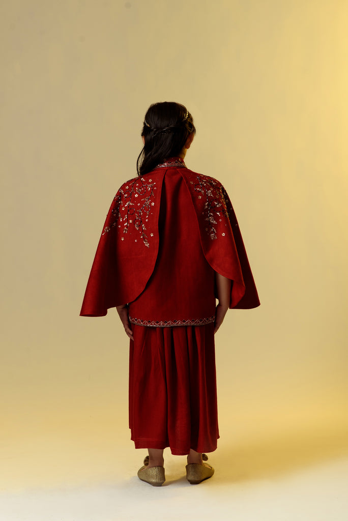 Rosy Finch is a Double Flared Red Embroidered Jacket With Long Woollen Dress For Girls.