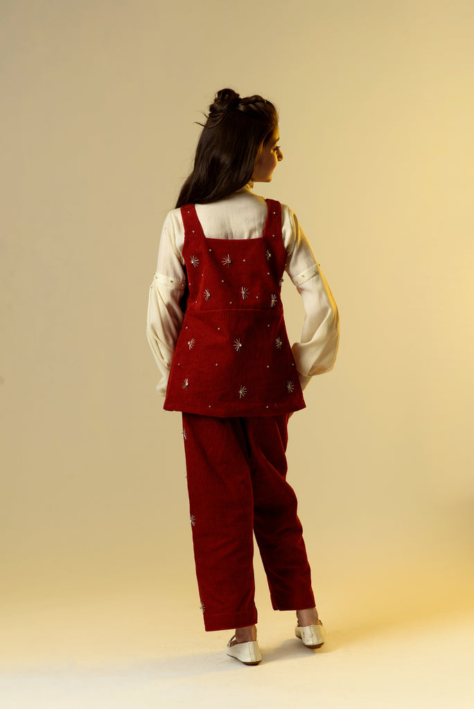 Isle of Dreams is a Carmine Red Organic Corduroy Coordinate Set With Off White Woollen Shirt For Girls.
