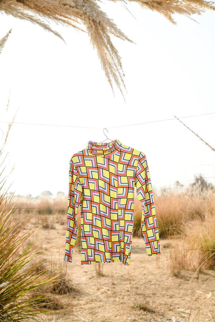Mottled Wodge is an Organic Cotton Knitted Long-Sleeve T-Shirt For Boys.