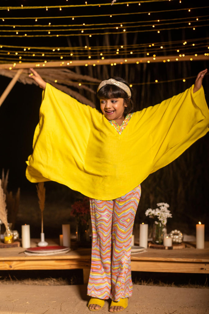 Bombshell Radiance is a Yellow Color Kaftan Coordinate Set with Orange Fabric Trouser for Girls.