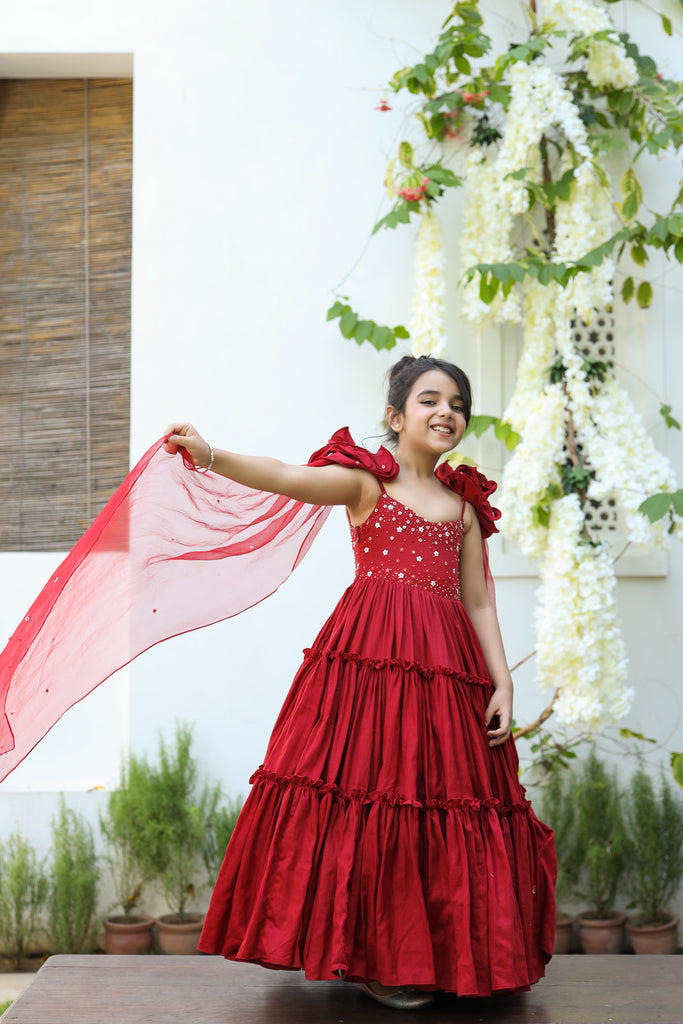 Aita is a red color Organic Vegan Silk Tiered Gown with Draped Dupatta for Girls.