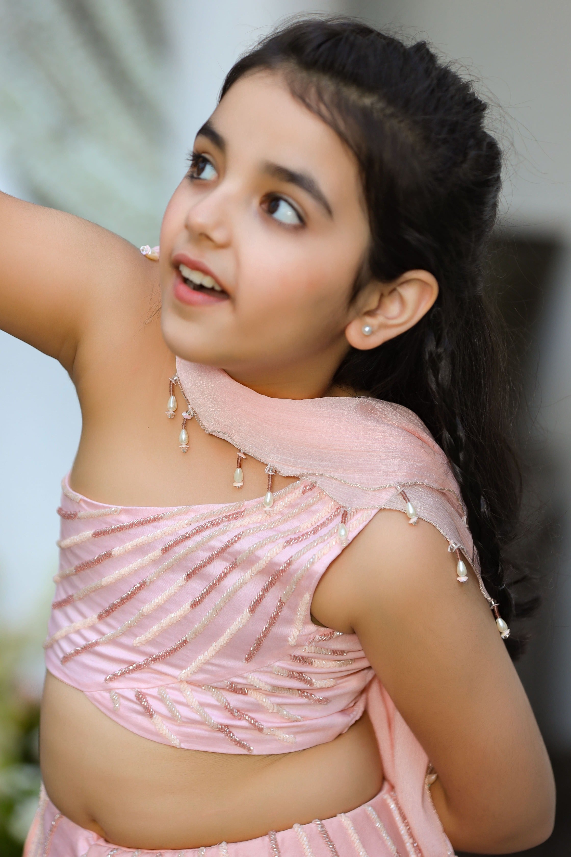 Khwabeeda is an Embroidered Three-Piece Lehenga Set For Girls.