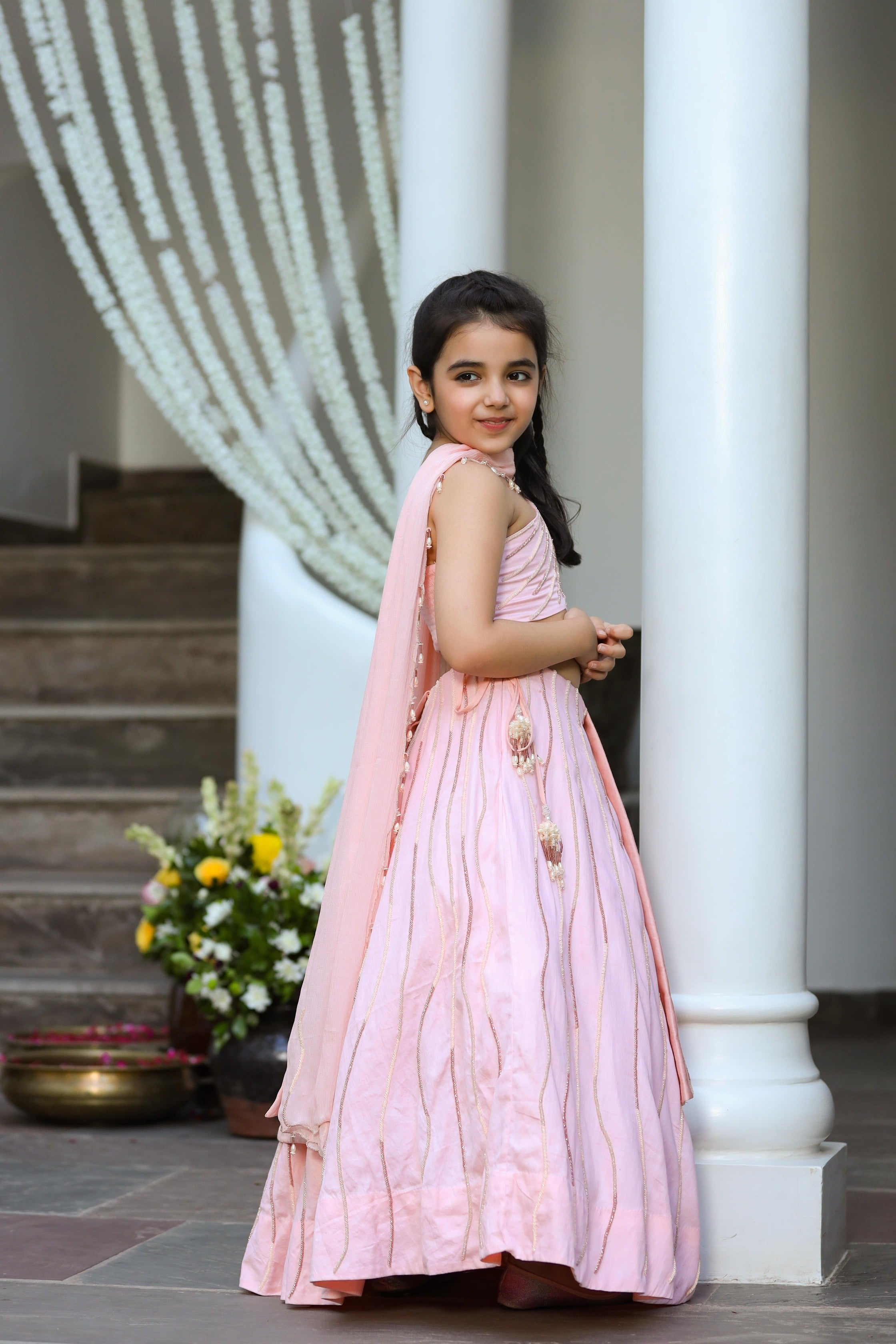 Khwabeeda is an Embroidered Three-Piece Lehenga Set For Girls.
