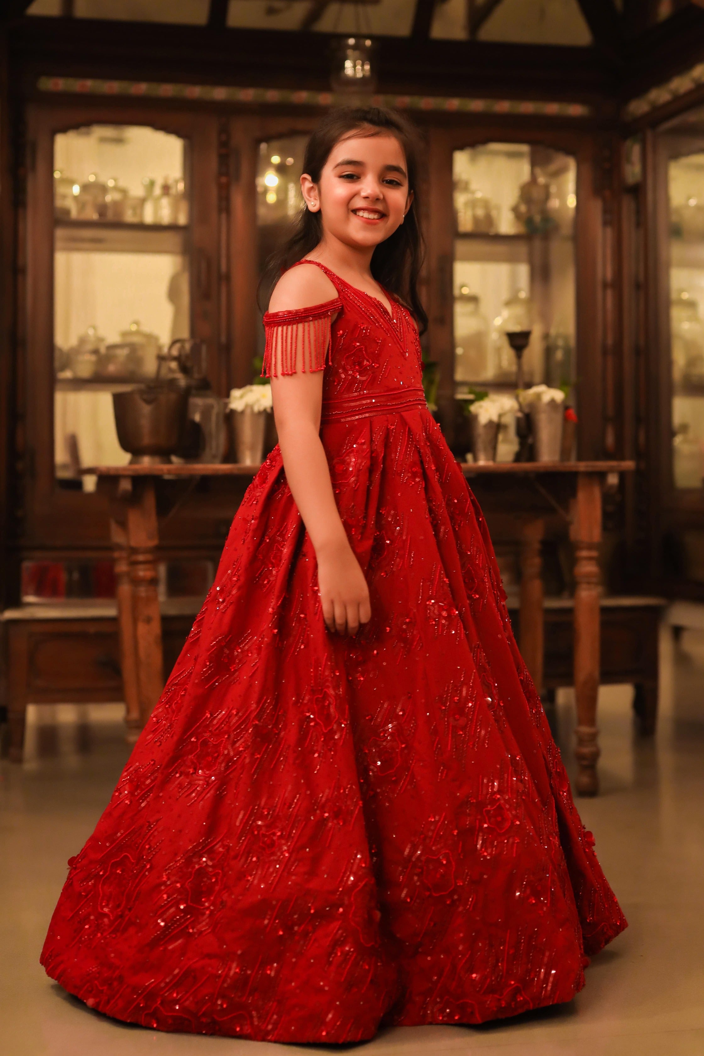 Surkh- is a V-Neck Embroidered Ball Gown For Girls.