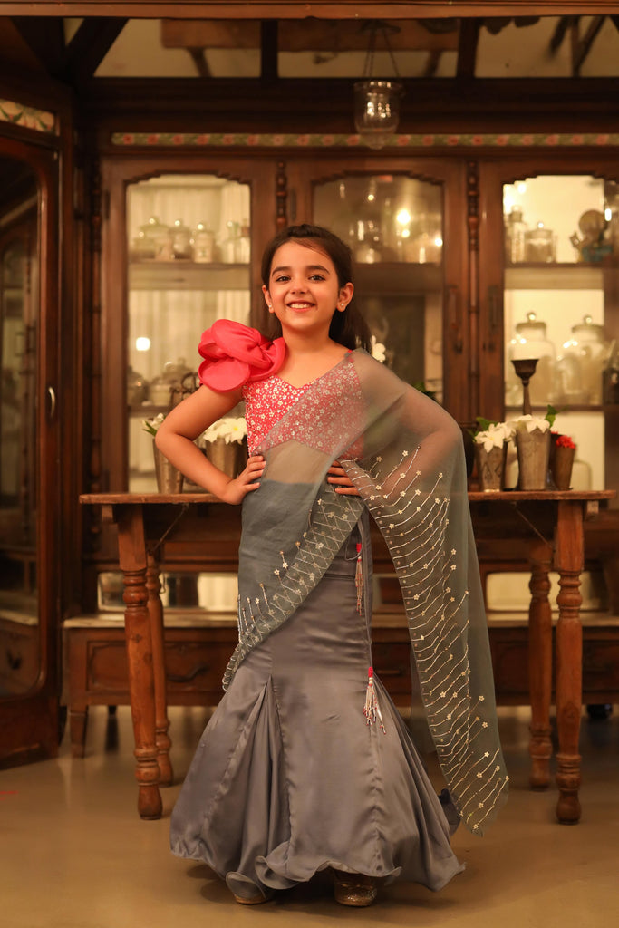Masarrat is an Embroidered Blouse and Silk Organza Draped Saree with Skirt For Girls.
